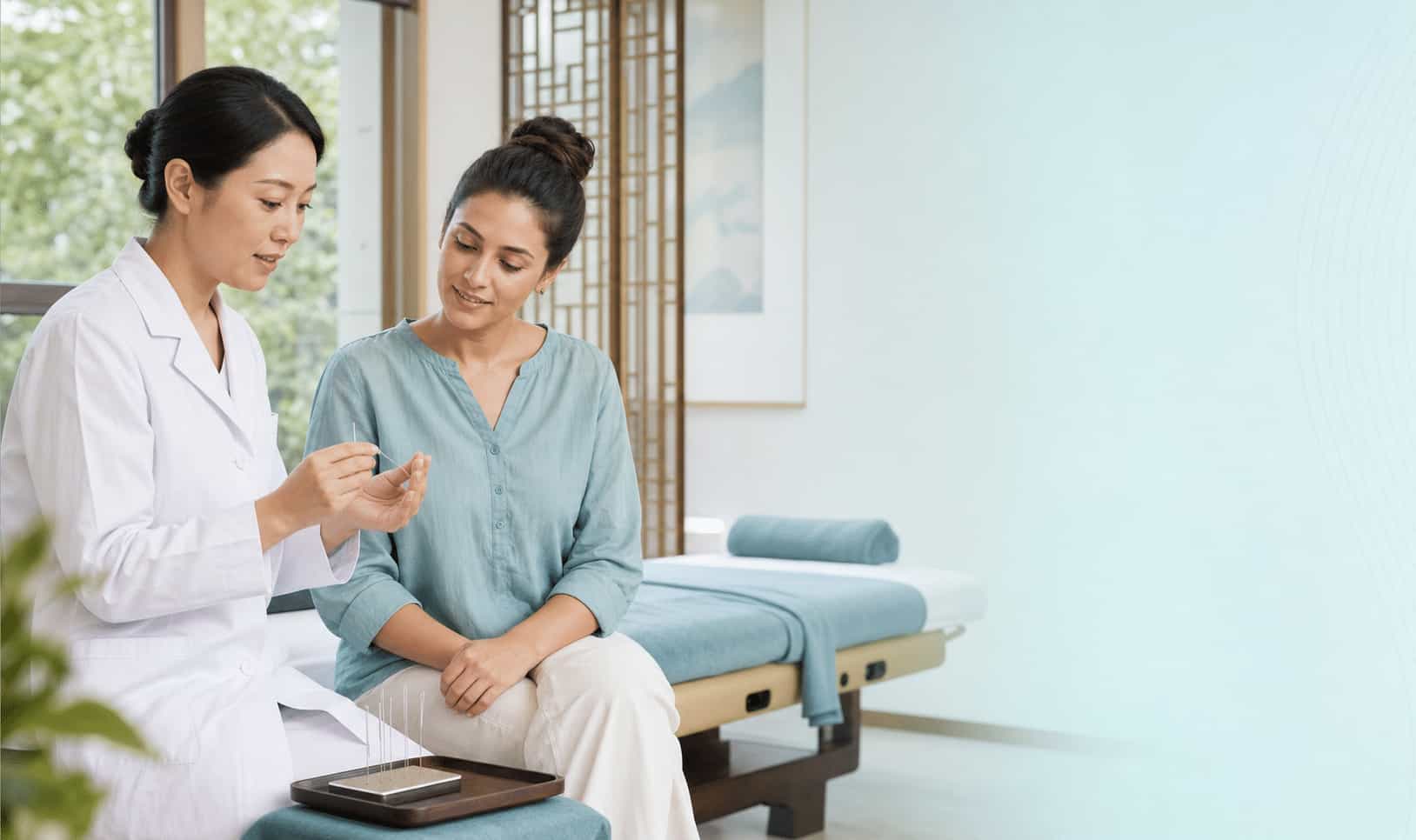 An international visitor learning about acupuncture from a Chinese medicine practitioner